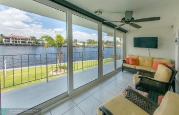 Amazing water views from beautifully enclosed patio with High impact sliders