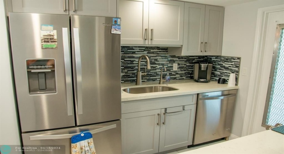 Beautifully updated kitchen with stainless appliances