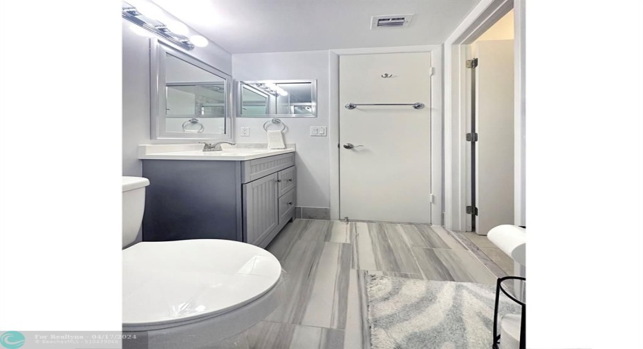 Additional Access is provided w/Hallway entrance to this Bath.