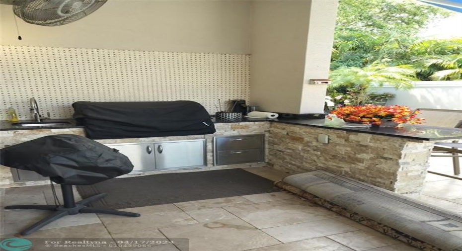 Custom BBQ Summer Kitchen with Fan and outdoor TV
