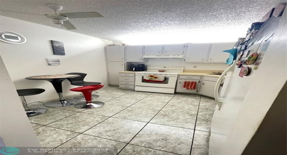 Spacious kitchen has eat-in area