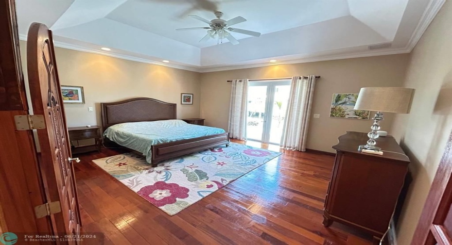 Master bedroom with teak floors