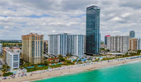 ENJOY EXCLUSIVE BEACHFRONT LOCATION AND PRIVATE COASTLINE FLORIDA LIFESTYLE LIVING DIRECTLY ON THE SAND AT PARKER PLAZA ON HALLANDALE BEACH