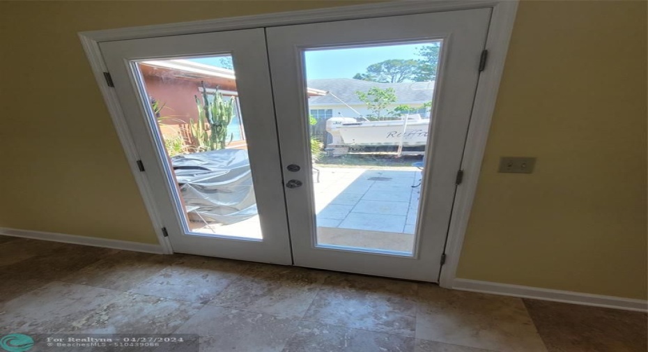 French doors from kitchen to side patio