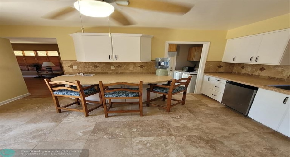 Kitchen (saturno marble flooring & sand/seashell concrete countertops)