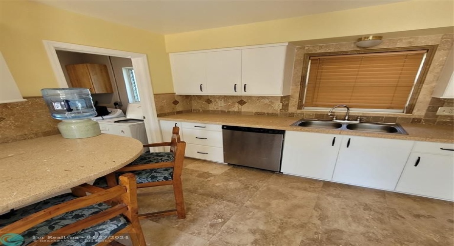 Kitchen (saturno marble flooring & sand/seashell concrete countertops)