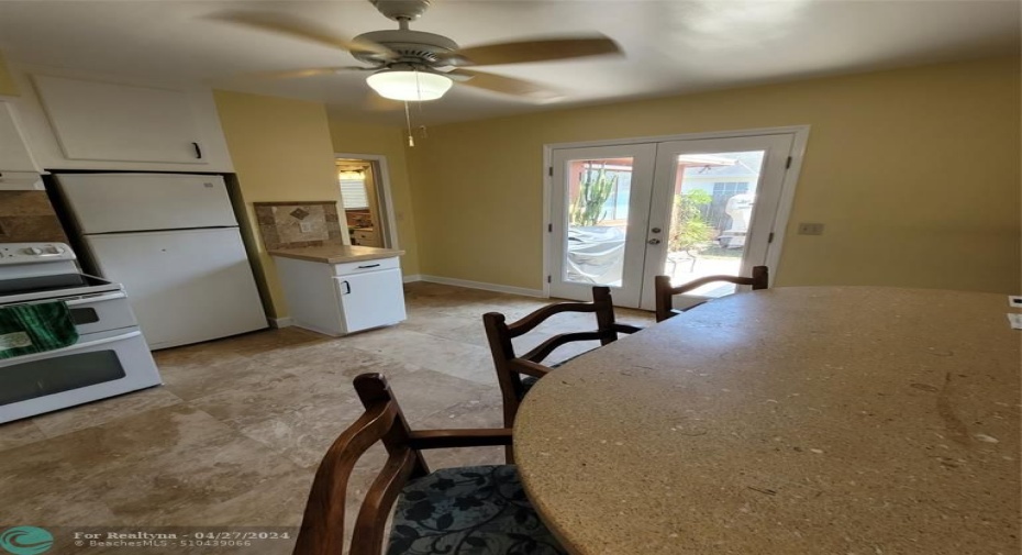 Kitchen (saturno marble flooring & sand/seashell concrete countertops)