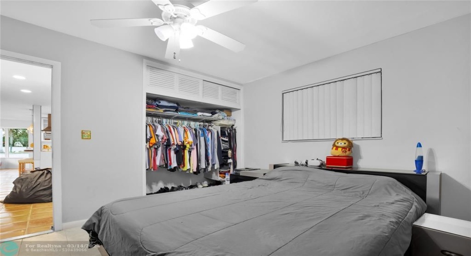 This waterfront bedroom features brand new ceiling fan, and has extra storage above closet.
