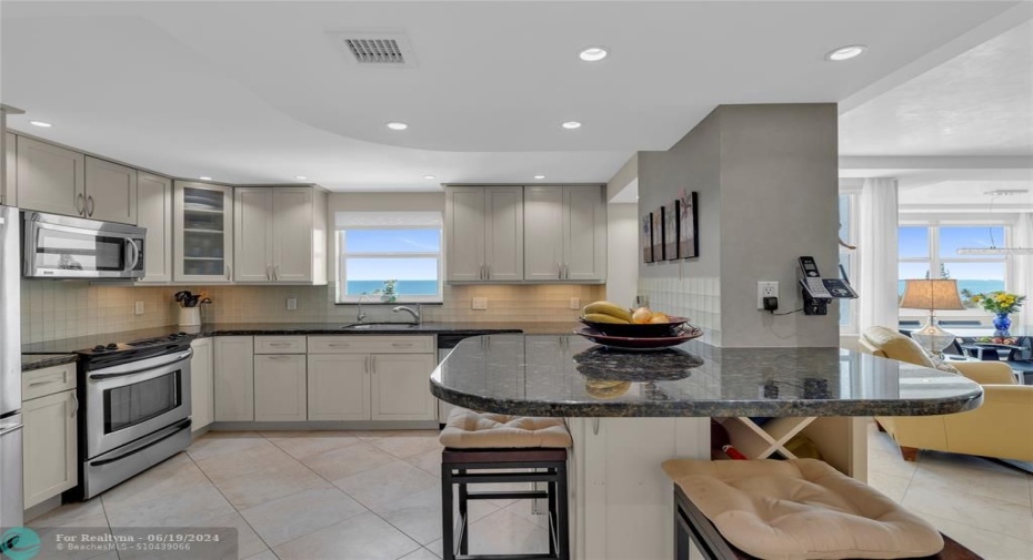 Large eat-in kitchen offering DIRECT OCEAN VIEWS!