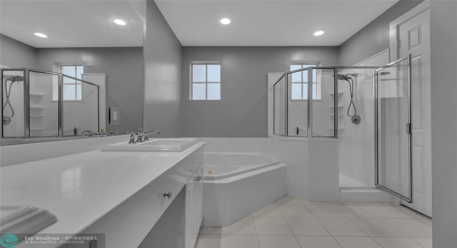 Master bathroom offers double vanity, walk in shower & large Kohler tub with jets