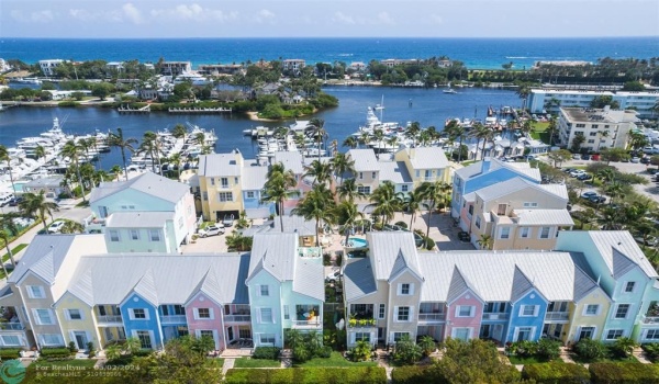 Key West Style Tillotson Square Community located across from the Lighthouse Point Marina