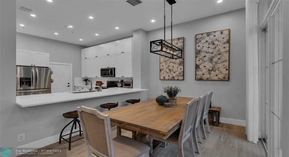 Spacious dining room is open into newly renovated kitchen