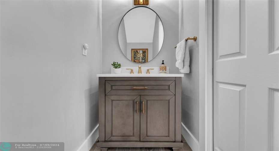 Half bathroom with new quartz vanity