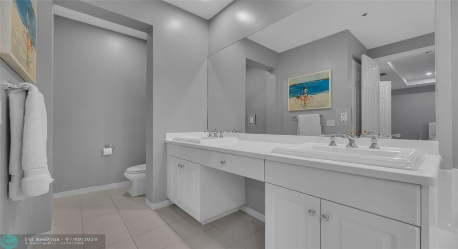 Large master bathroom with walk in shower and double vanity