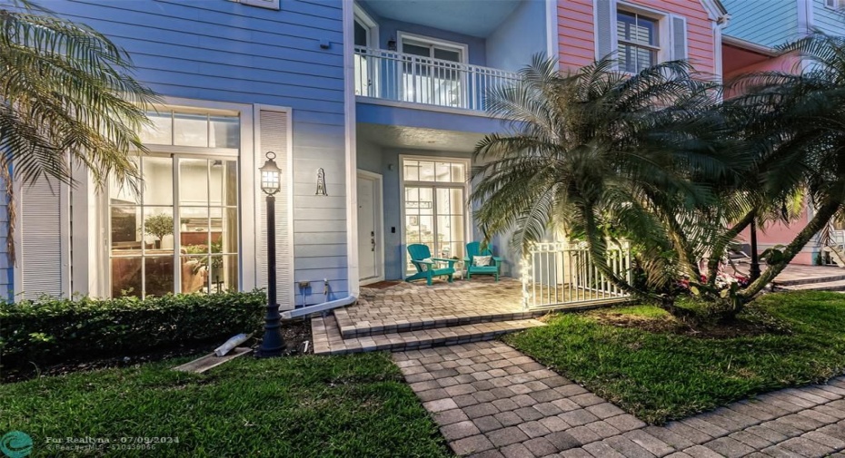 Enjoy your private front porch as you watch the neighbors and marina traffic go by