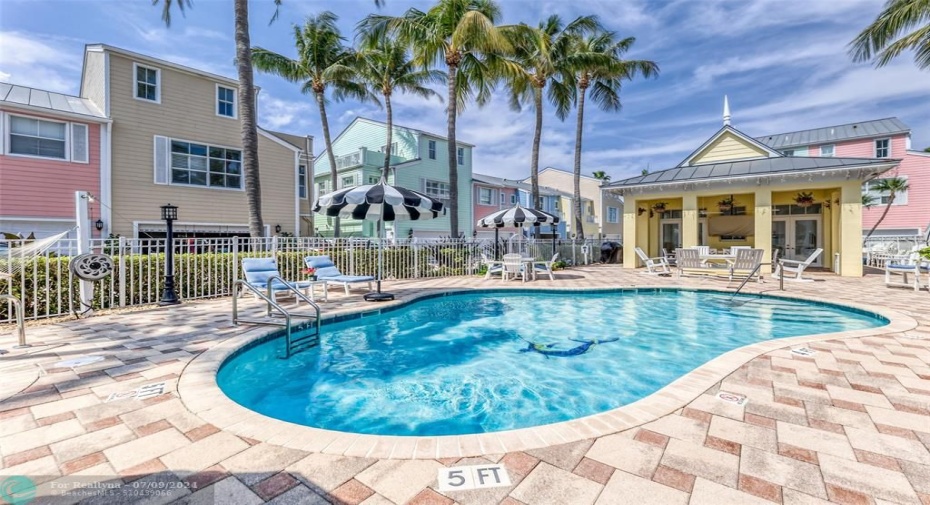 This unique townhouse community offers resort style pool with fire pit
