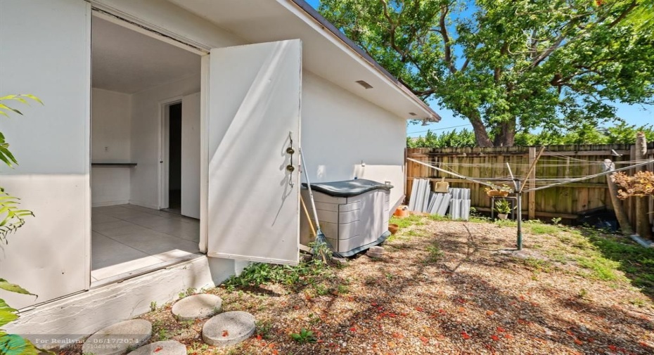 SIDE DOOR TO FENCED OUT DOOR SPACE