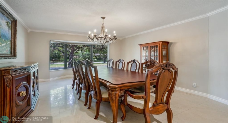 Spacious dining room, ample room for a table seating 10+ and buffets on both sides.  Gorgeous bay window.