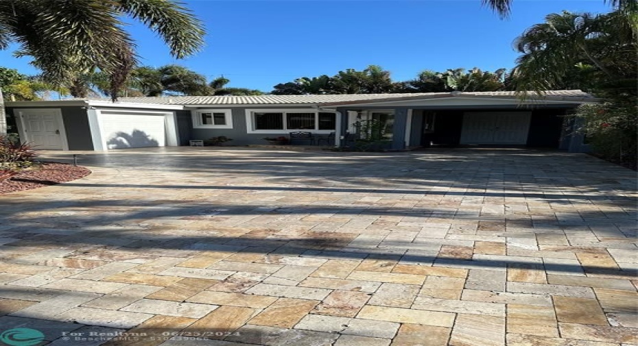 Front Entrance with Carport and Garage