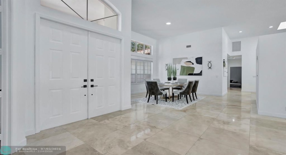 Gleaming saturnia marble flooring, newly painted interior is crisp and chic.