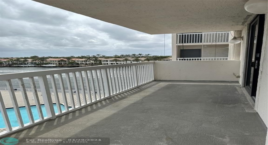 L shape Balcony on SE corner Unit overlooking pool and Intracostal view (S+W+ E  view)