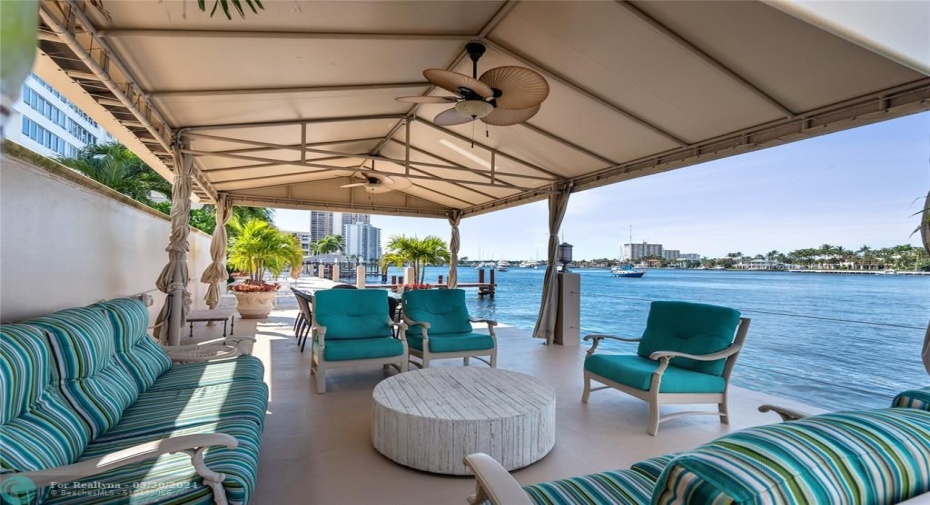 Covered seating by the Intracoastal with a grill