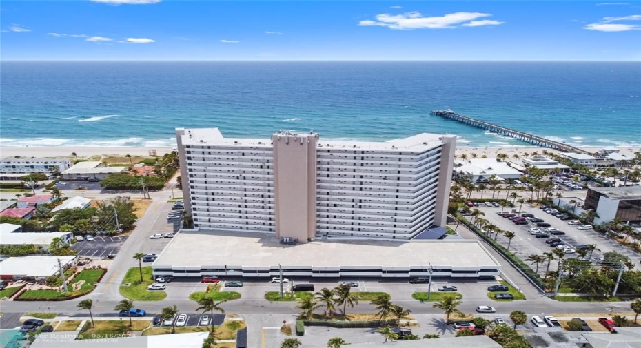 West side of Tiara show 2 level parking garage and proximity to fishing pier