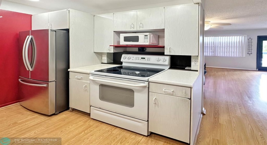 Stainless Steel Refrigerator & White Stove