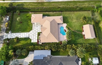 DRONE VIEW SHOWING BOTH MAIN HOME AND GUEST HOME-NO NEIGHBORS DIRECTLY TO NORTH OF HOUSE-