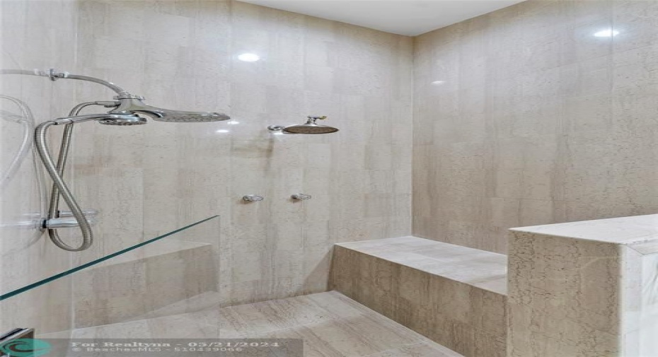 MARBLE SHOWER FLOOR TO CEILING WITH SEATING AREA