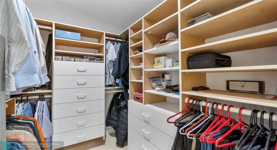 CALIFORNIA BUILT IN DRAWERS AND SHELVES ONE OF TWO LARGE WALK IN CLOSETS-SAFE IN THIS CLOSET