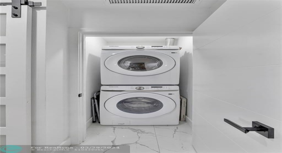 Washer and dryer inside the unit