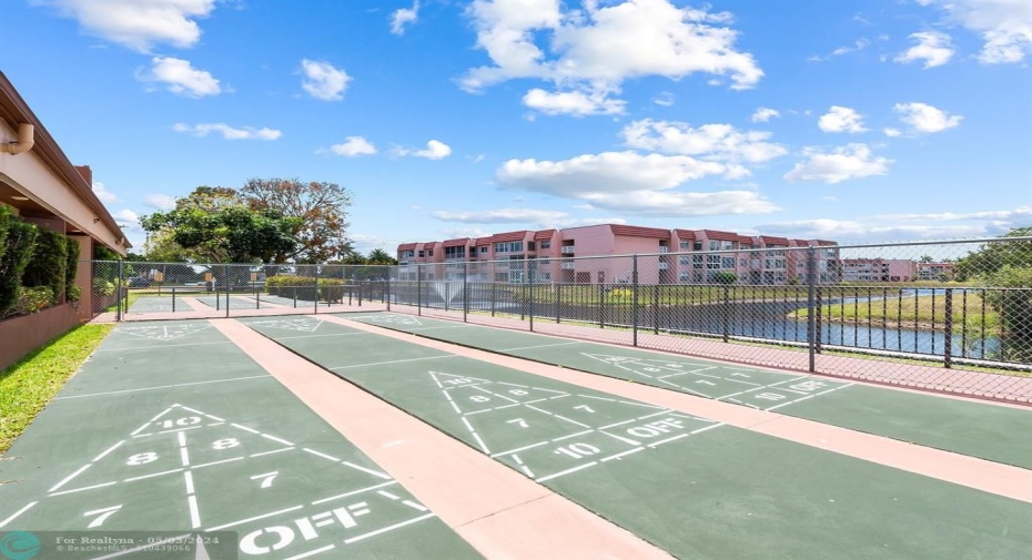 Shuffleboard. The community also features tennis and pickleball courts.