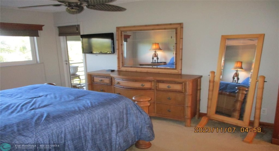 main bedroom with queen furniture