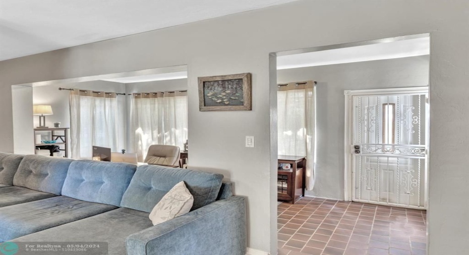 View of Foyer and Front Door Entrance from Dining Area