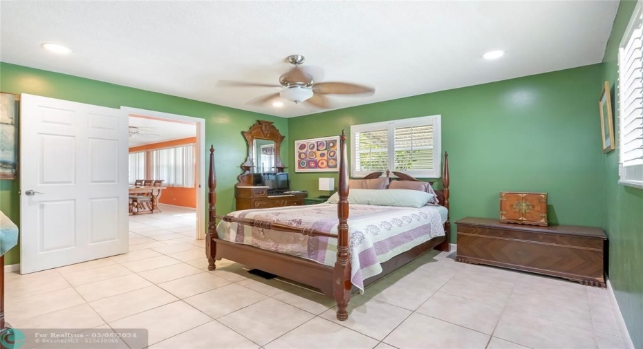 The master bedroom boasts a spacious layout, easily accommodating all of your furniture