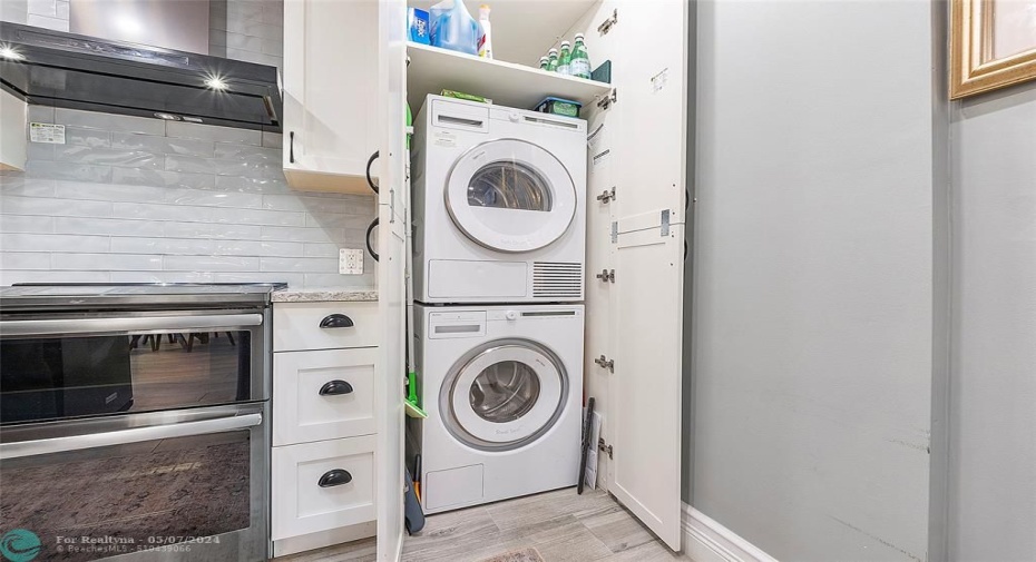 Washer & Dryer in Hidden Custom Cabinetry