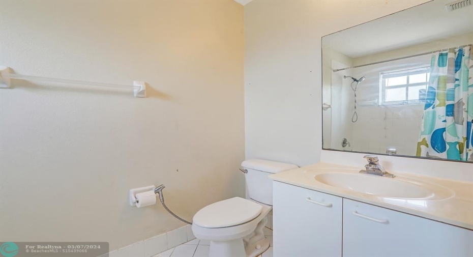 FULL GUEST BATHROOM LOCATED UPSSTAIRS