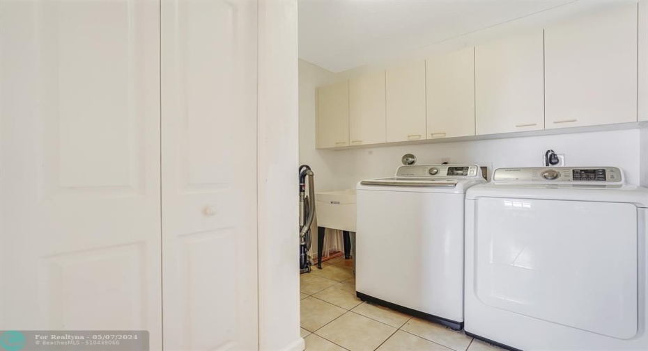 LAUNDRY ROOM LOCATED UPSTAIRS