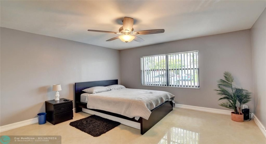 Very spacious master bedroom with newer fan