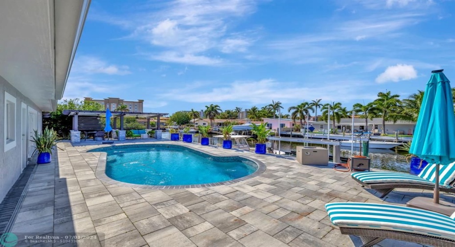 Plenty of space to lounge by pool, under cover or under the sun!