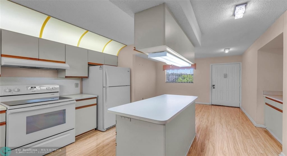 Open kitchen and bonus area for home office, or just relaxing. Great for Kid space!