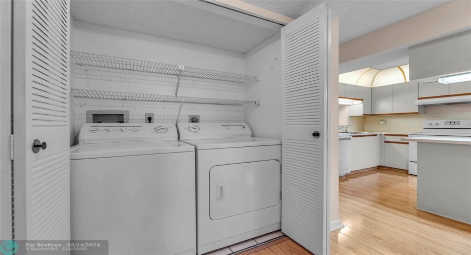 Full Size washer and dryer conveniently located off the kitchen and Guest Bath