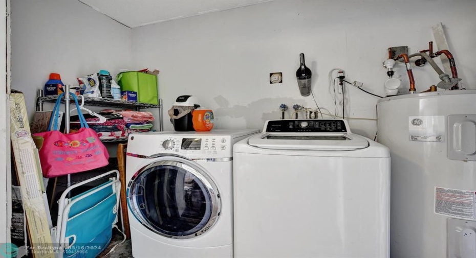Laundry closet, located in Family Room