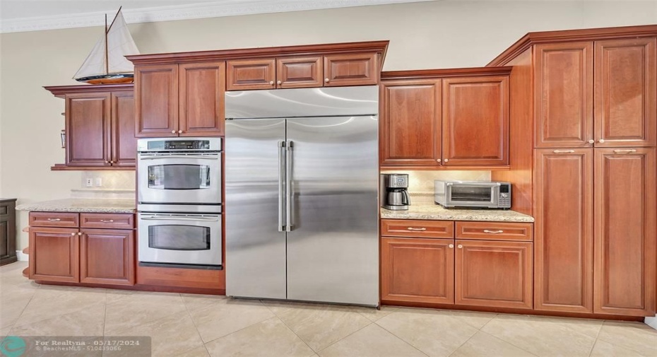Tons of cabinet space and there's a spacious walk-in pantry around the corner