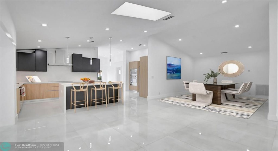 LARGE dining room flow to open kitchen.