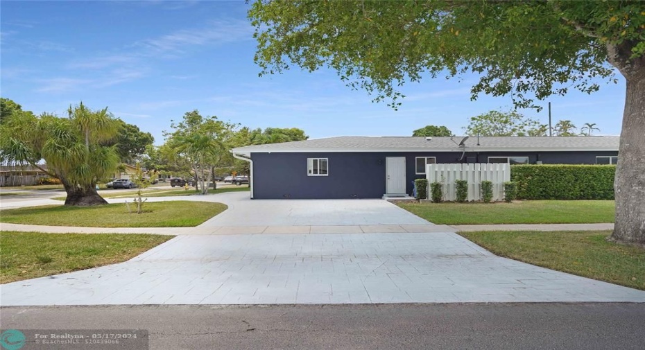 This house is located on a corner lot, so you have plenty of parking; 2 garage spaces, parking in front of the garage and parking on the side of the house.