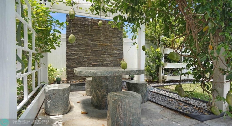 The stone chairs and table are jade.