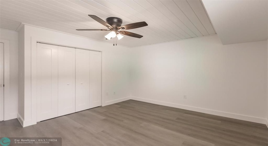 Master bedroom closet and ceiling fan