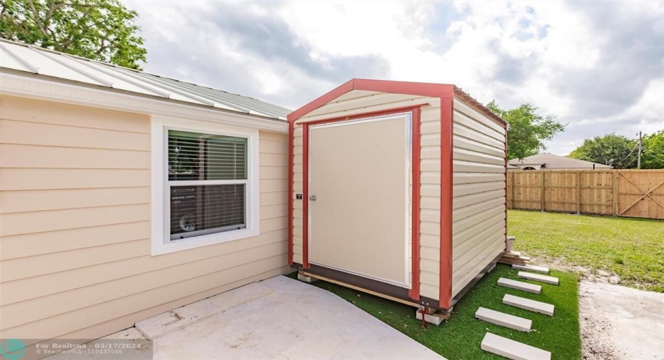 Utility room with washer and dryer